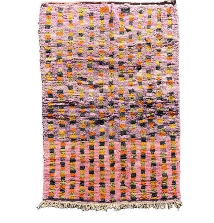 Berber carpet boujaad pink and purple with multicolored squares.