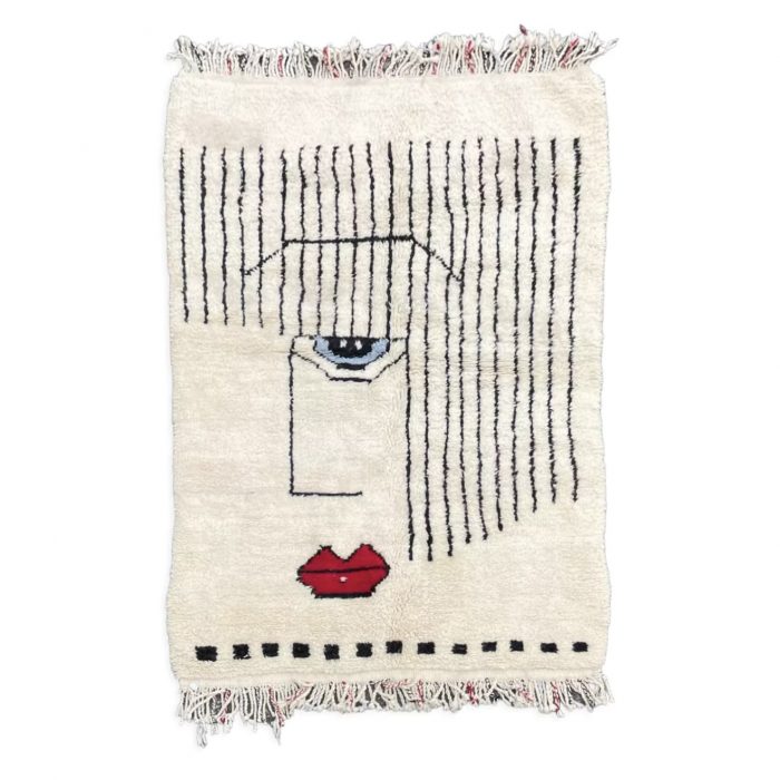 Small modern Berber living room carpet with abstract motifs representing a face.