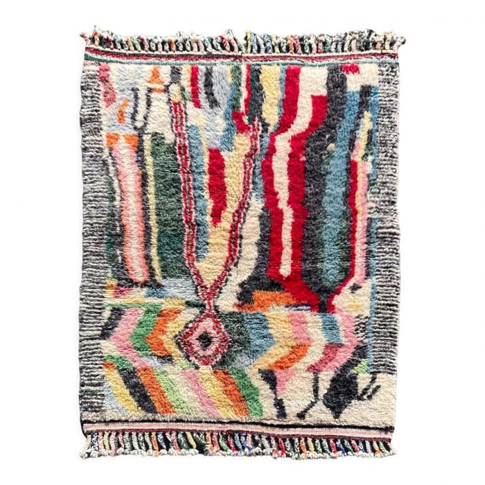 Small coffee table rug, modern and contemporary with abstract patterns of all colors.